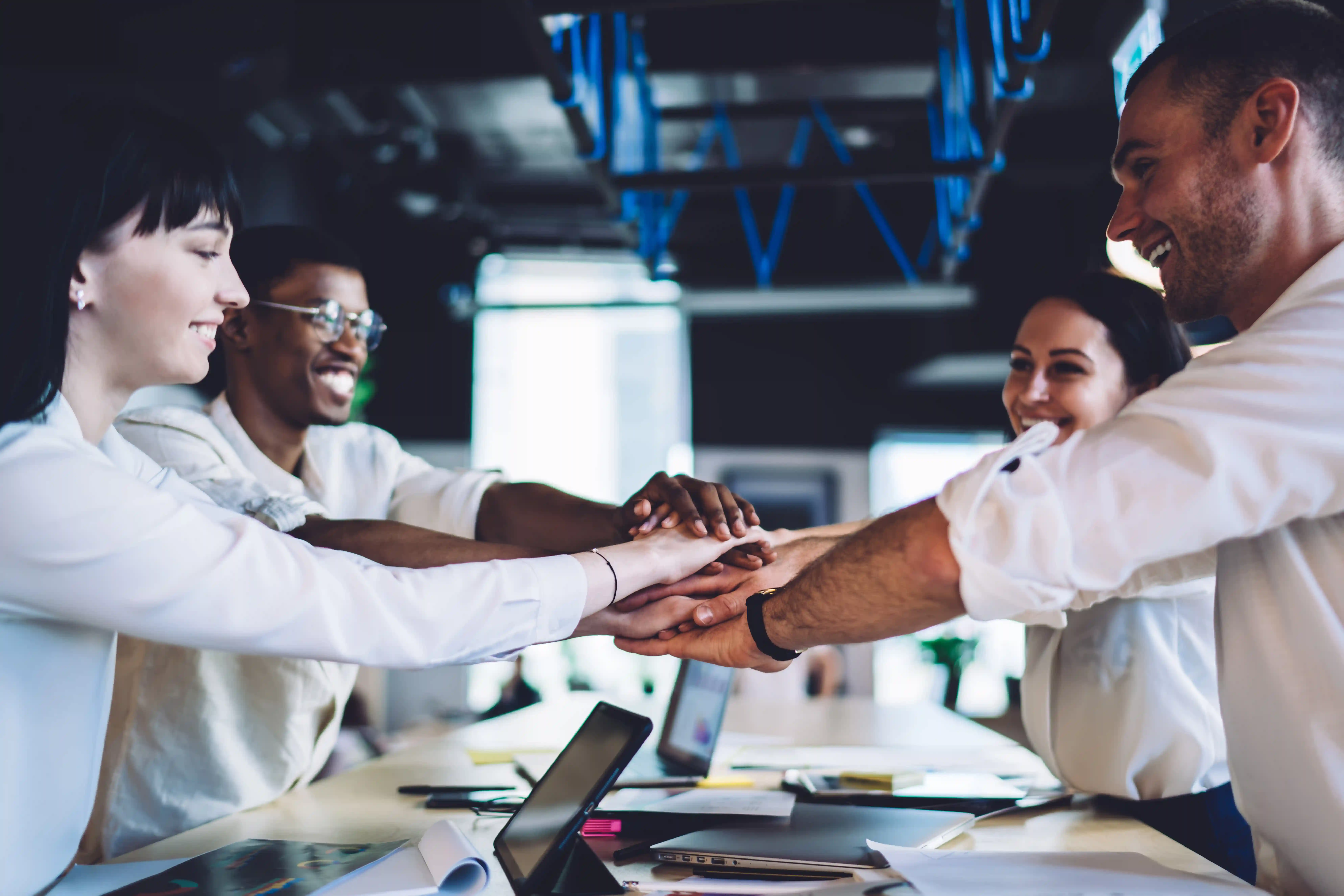 Dynamics Monk team collaboration driving collective productivity, workplace momentum, employee engagement, business efficiency, and connected teamwork through AI-powered solutions.